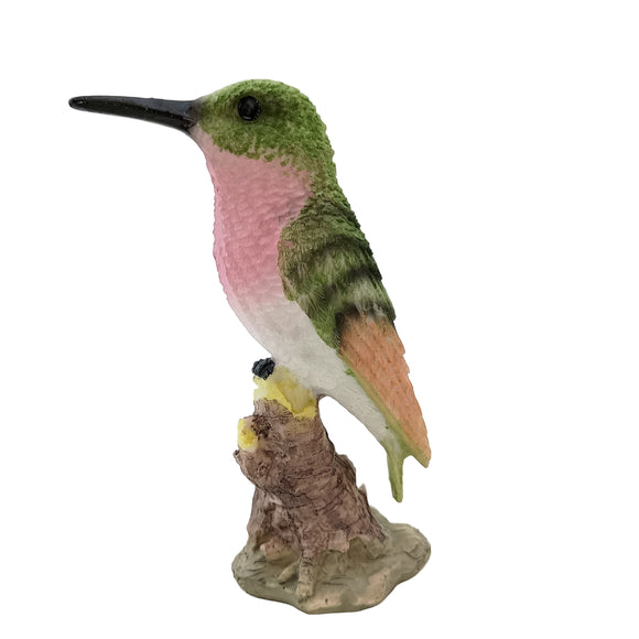 Colorful hummingbird figurine on a white background