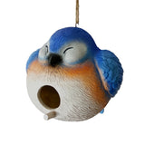 Blue and orange bird-shaped birdhouse on a plain background