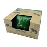 Green toad house in a cardboard box with 'Toad House' branding on a white background